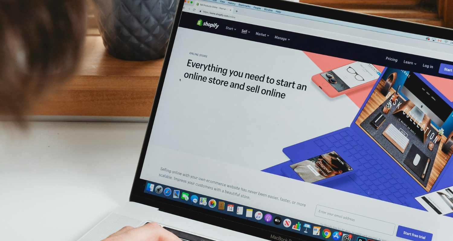 Browsing homepage of Shopify main site